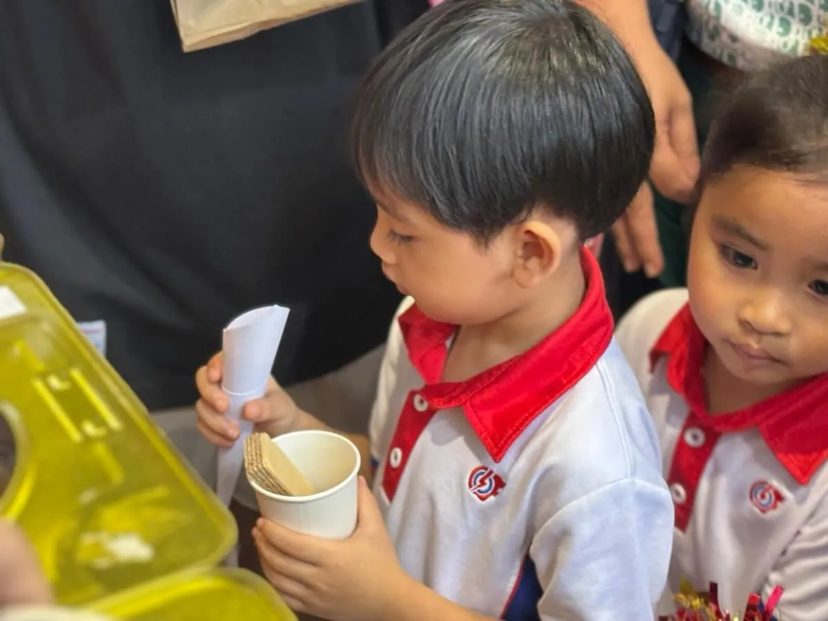 Guests at a carnival snack station