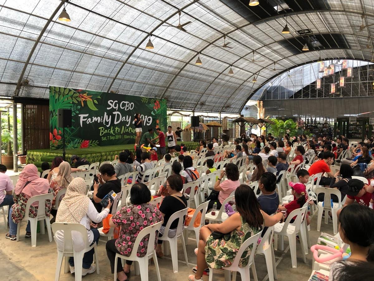 Crowd at a family day held at a greenhouse venue