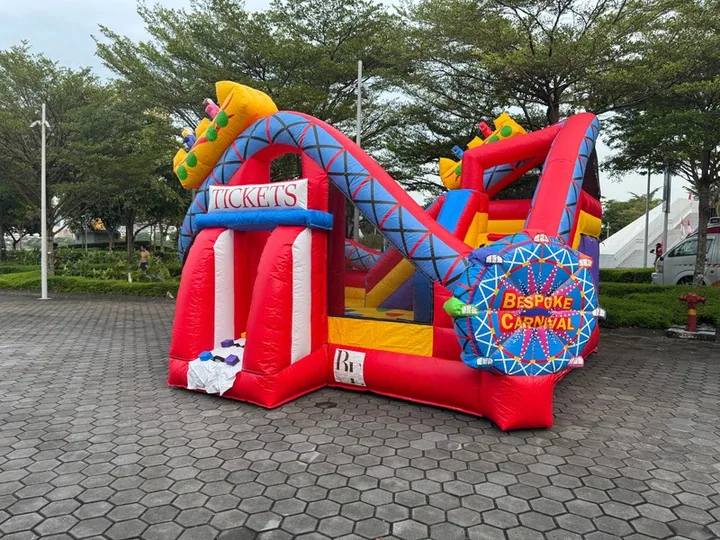 Bespoke carnival bouncy castle with slide